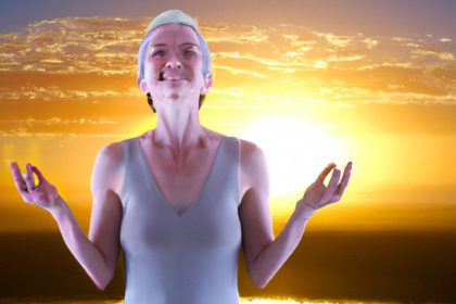 Happy Woman Practicing EFT at Sunrise