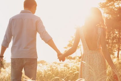 Couple Walking At Sunset