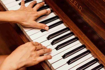 Teacher and Student Playing Piano