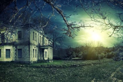 Haunted House at Night Under Moonlight