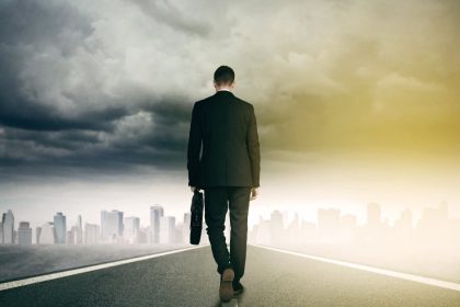 Man Walking Towards a City - Clouds In The Sky