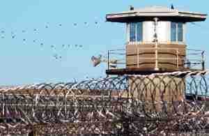 Prison Wall with Tower & Barbed-Wire Fence