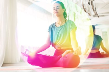 Woman Meditating in Colored Bubble